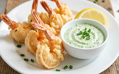 Shrimp in a light batter with garlic and sorrel-curd dip (fusion)