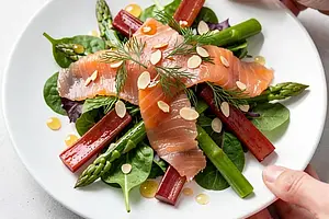 Rhubarb and smoked salmon on a mixed salad with honey-mustard dressing