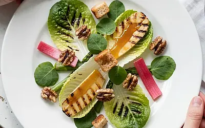 Grilled romaine lettuce with sorrel, asparagus, and oscypek cheese