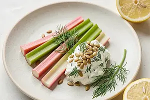 Rhubarb with dill, fresh cheese, and toasted sunflower seeds