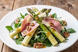 Warm asparagus and cured ham salad with arugula