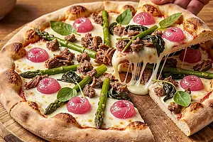 Rustic pizza with pulled sausage, sorrel, and caramelized rhubarb