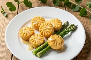 Mini Silesian dumplings with butter and asparagus