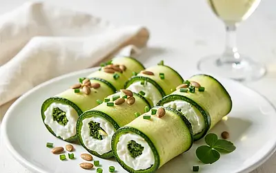 Zucchini rolls stuffed with cottage cheese and fresh sorrel