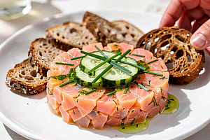Salmon tartare with pickled cucumber and dill oil