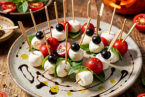 Scary skewers with mozzarella and tomatoes