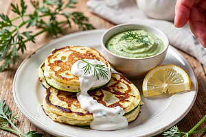 Zucchini and White Cheese Fritters with Yogurt Sauce