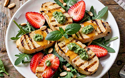 Grilled oscypek with basil pesto and fresh strawberry