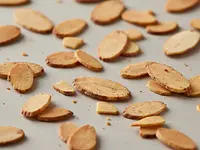 Toasted almond flakes (optional)