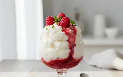 Light as a Cloud White Chocolate Mousse with Raspberry Sauce and a Hint of Mint
