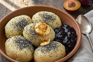 Creamy potato dumplings with poppy seeds, plum jam, and browned butter