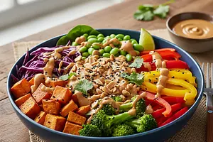 Rainbow Power Bowl with Roasted Sweet Potato and Peanut Sauce