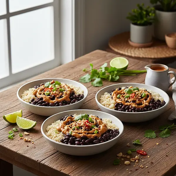 Protein Power Balls with Quinoa and Black Beans with Spicy Peanut Sauce