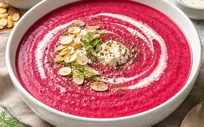 Creamy roasted beet soup with a hint of horseradish and toasted almonds