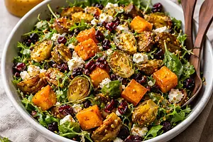 Autumn salad with roasted butternut squash, Brussels sprouts, and maple mustard dressing