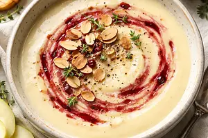 Creamy Parsnip and Pear Soup with Toasted Almonds and Cranberry Oil
