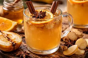 Warming winter elixir with roasted pear, orange, and ginger