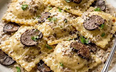 Ravioli with ricotta in truffle sauce