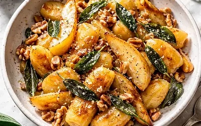 Quick gnocchi with sage, caramelized pear, and toasted nuts