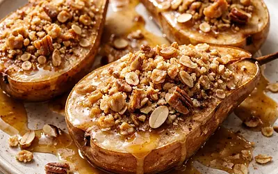 Baked spiced pears with almond-oat crumble and vanilla-caramel sauce