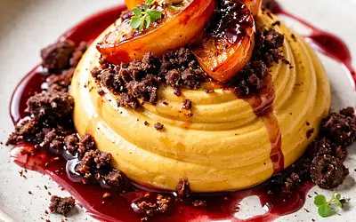 Modern pumpkin mousse with roasted persimmon, chocolate crumble, and red wine sauce (variant b7340407)