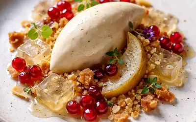 Pear mousse with Earl Grey jelly, almond crumble, and pomegranate pearls