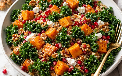 Winter salad with roasted butternut squash, kale, quinoa, and pomegranate