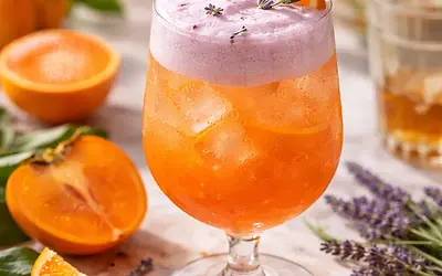 Sparkling clementine-persimmon cocktail with lavender foam (variant b719d4f8)
