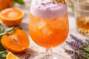 Sparkling clementine-persimmon cocktail with lavender foam (variant b719d4f8)