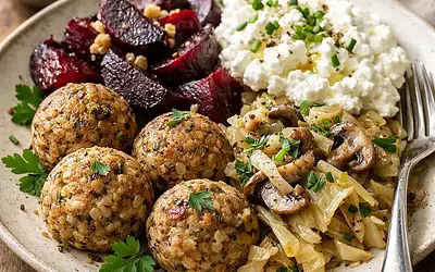 Buckwheat comfort balls with roasted beetroot, cottage cheese, and sautéed cabbage with mushrooms