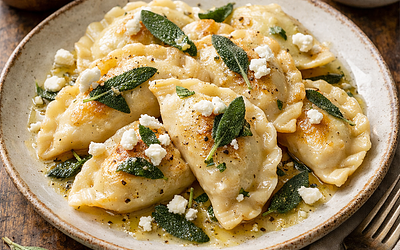 Pierogi with Sauerkraut and Goat Cheese, Drizzled with Sage Butter